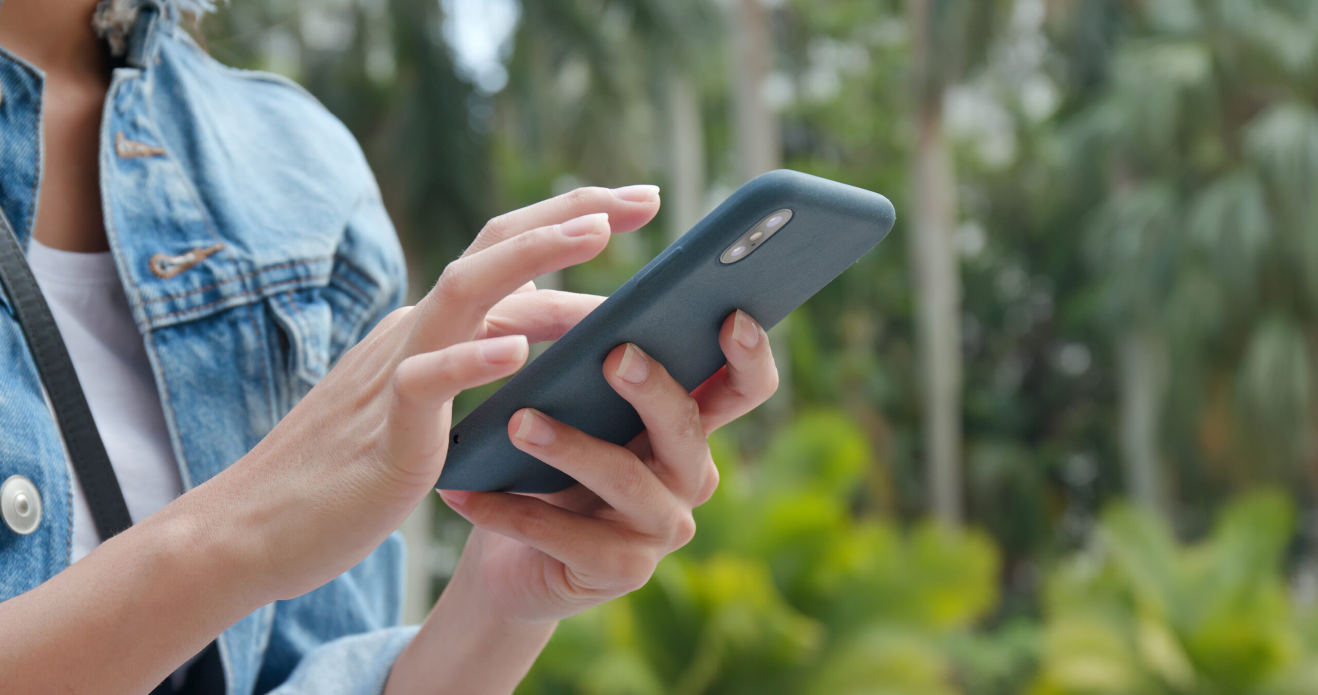 Woman use of cellphone at outdoor